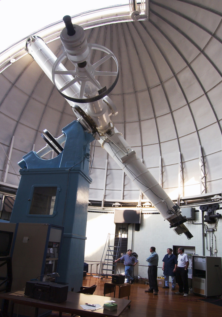 030826-N-9593R-043 Washington, D.C. (August 26, 2003) -- Personnel at the U.S. Naval Observatory in Washington, D.C., prepare the facilities historic 26-inch refractor telescope for optical viewing of Mars. The telescope is the same one that discovered Phobos and Deimos, the two moons of Mars, in 1877. The telescope, which still uses the original optics, normally has a camera known as a speckle interferometer mounted in the viewing position for deep space studies. The United States Naval Observatory (USNO) performs an essential scientific role for the U.S. Navy, and Department of Defense (DOD). Its mission includes determining the positions and motions of the Earth, Sun, Moon, planets, stars, and other celestial objects; providing astronomical reference data; measuring the Earths rotation and orientation; determining precise time; and maintaining the Master Clock for the United States. U.S. Navy photo by Chief Warrant Officer 4 Seth Rossman (RELEASED)